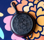 Lodge 10.25 Inch Pre-Seasoned Cast Iron Stamped Skillet - Signature Teardrop Handle - Use in the Oven, on the Stove, on the Grill, or Over a Campfire - Sugar Skull