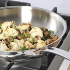 Sur La Table Kitchen Essentials Chef's Deck 11-Inch Large Stainless Steel Frying Pan – Induction Ready Skillet with Tri-Ply Base, Polished Finish & Hollow Stay-Cool Handle