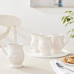 Firenze Ivory 16 oz Pedestal Ceramic Mugs, Set of 4 – Vintage-Inspired Embossed Drinkware with Easy Grip Handle – Elegant White Coffee and Tea Cups for Everyday or Entertaining