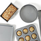 Calphalon Titan 10-Piece Nonstick Bakeware Set, Steel Core PFA-Free Nonstick Coating, Oven Safe, Includes Sheet Pans, Muffin Pan, Round Cake Pans, Loaf Pan and Cooling Rack, Silver