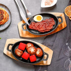 Mifoci 4 Pcs Mini Cast Iron Skillet with Wooden Base Small Cast Iron Fajita Plates Baker's Skillet Matte Black Pan Pot for Kitchen Restaurant Barbecue Dinner (8.7 x 4.7 x 1.6 Inches)